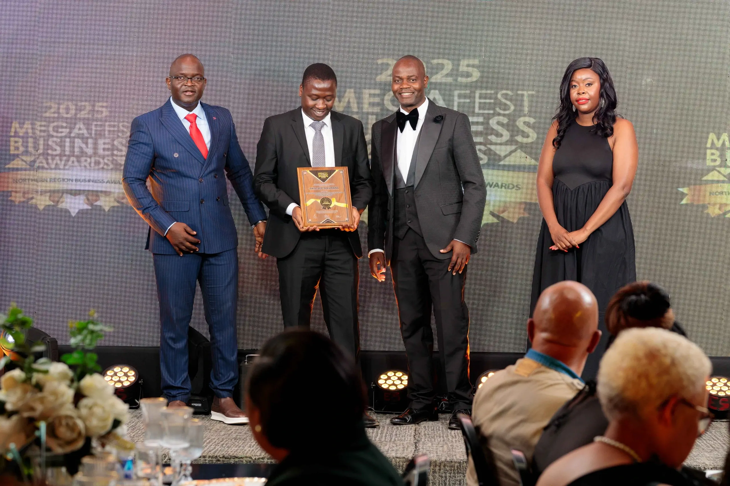 Walter K Mwanyisa receiving the Megafest Business Award 2025